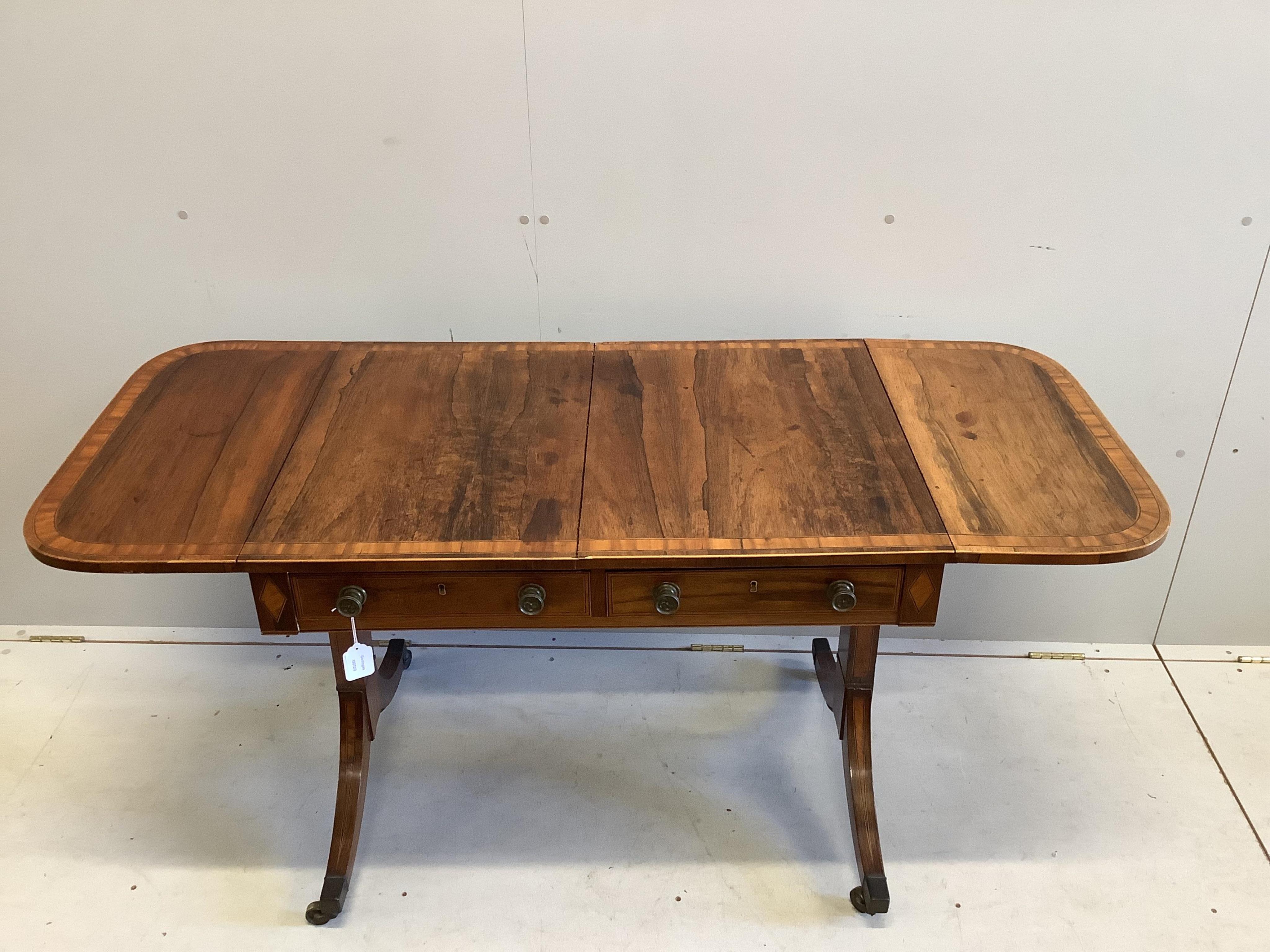 A Regency satinwood banded rosewood sofa table, width 90cm, depth 62cm, height 71cm